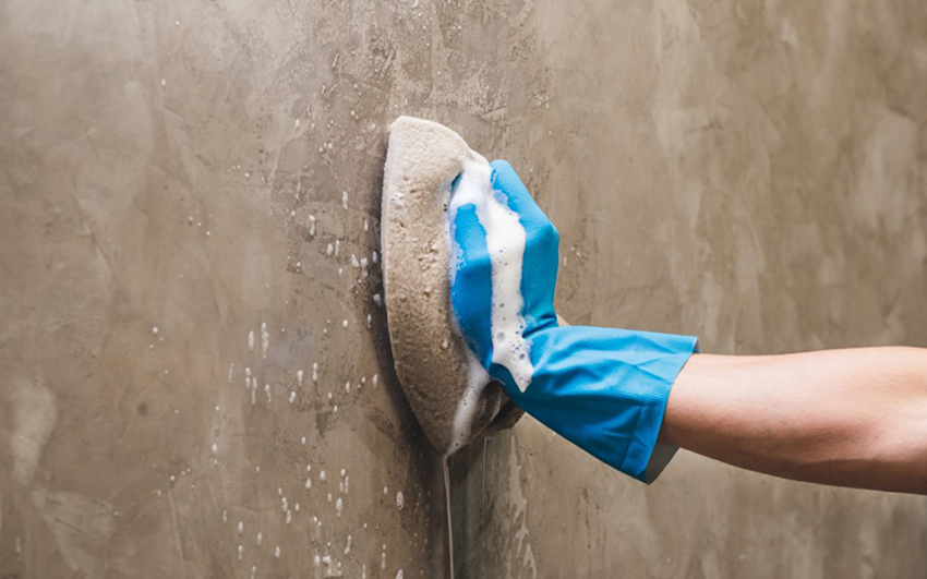 how to clean concrete walls