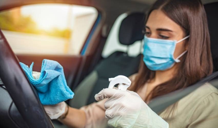How to Clean Your Home After Being Sick Wiping high-touch surfaces inside a car after illness