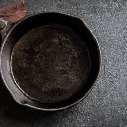 How to clean black residue off cast iron skillet using salt