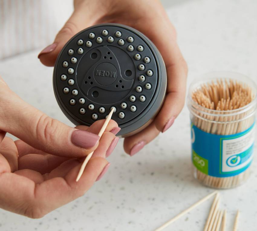 cleaning non-removable showerhead with toothpick