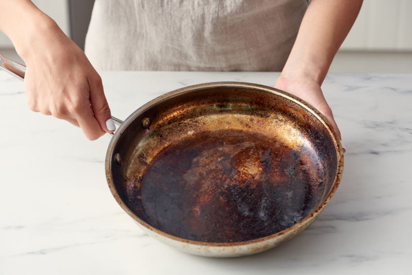 how to clean burnt on stainless steel pans